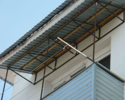 Остекление балкона + установка крыши + утепление с обшивкой